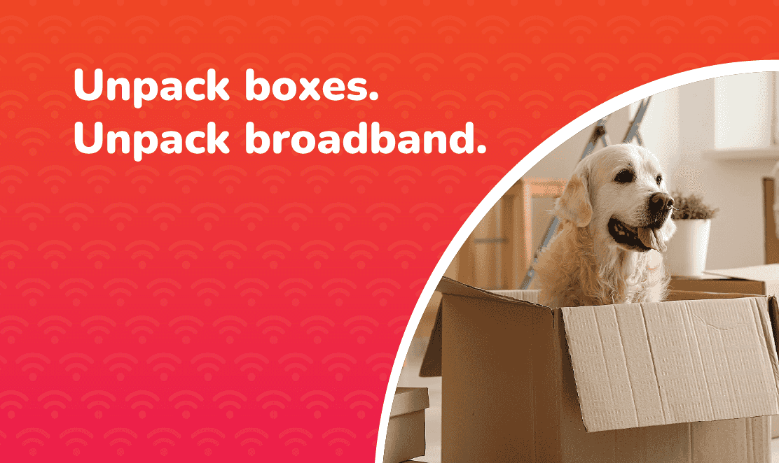 Golden retriever sitting in a cardboard moving box inside a new home, with the text "Unpack boxes. Unpack broadband." on a red and orange background.