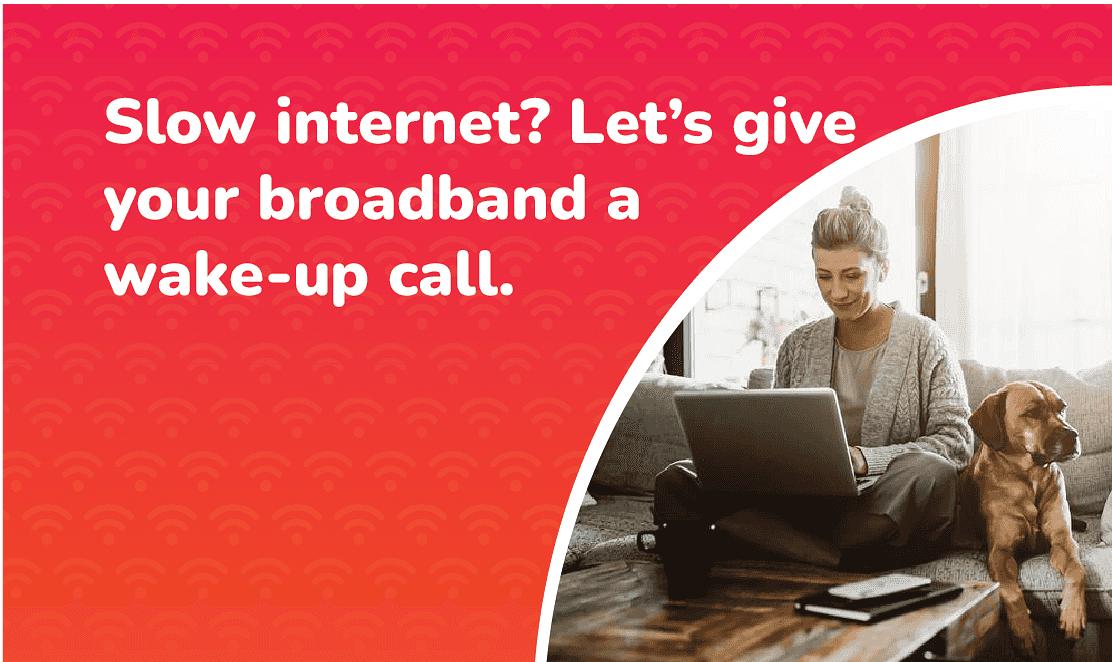 Woman sitting on a sofa with a laptop and her dog beside her, smiling while working online at home. Text reads “Slow internet? Let’s give your broadband a wake-up call.” promoting faster full fibre broadband from Fusion Fibre Group.