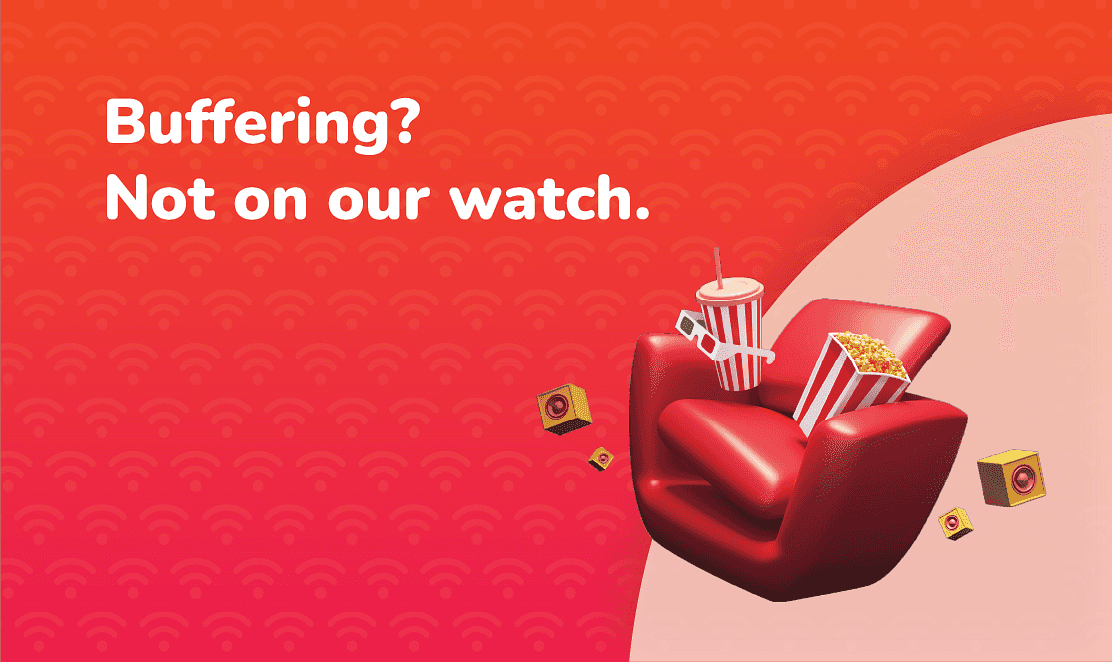 Red cinema-style chair with popcorn, drink, and 3D glasses on a Fusion Fibre Group red-orange background, with the text 'Buffering? Not on our watch.'
