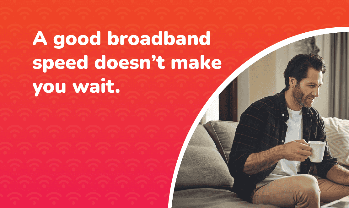 Man using laptop on sofa with coffee, alongside text ‘A good broadband speed doesn’t make you wait’ – illustrating the benefits of fast full fibre broadband in the UK.