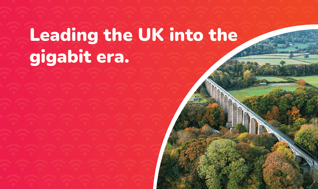 Fusion Fibre Group banner reading “Leading the UK into the gigabit era” with an aerial view of a countryside viaduct, representing nationwide full fibre broadband rollout under Project Gigabit.