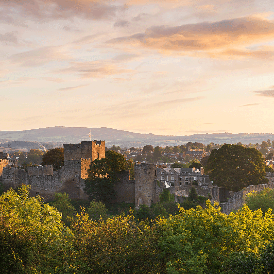 Scenic view of Ludlow Castle in Shropshire at sunset, representing Fusion Fibre Group’s full fibre broadband coverage across rural and urban areas.