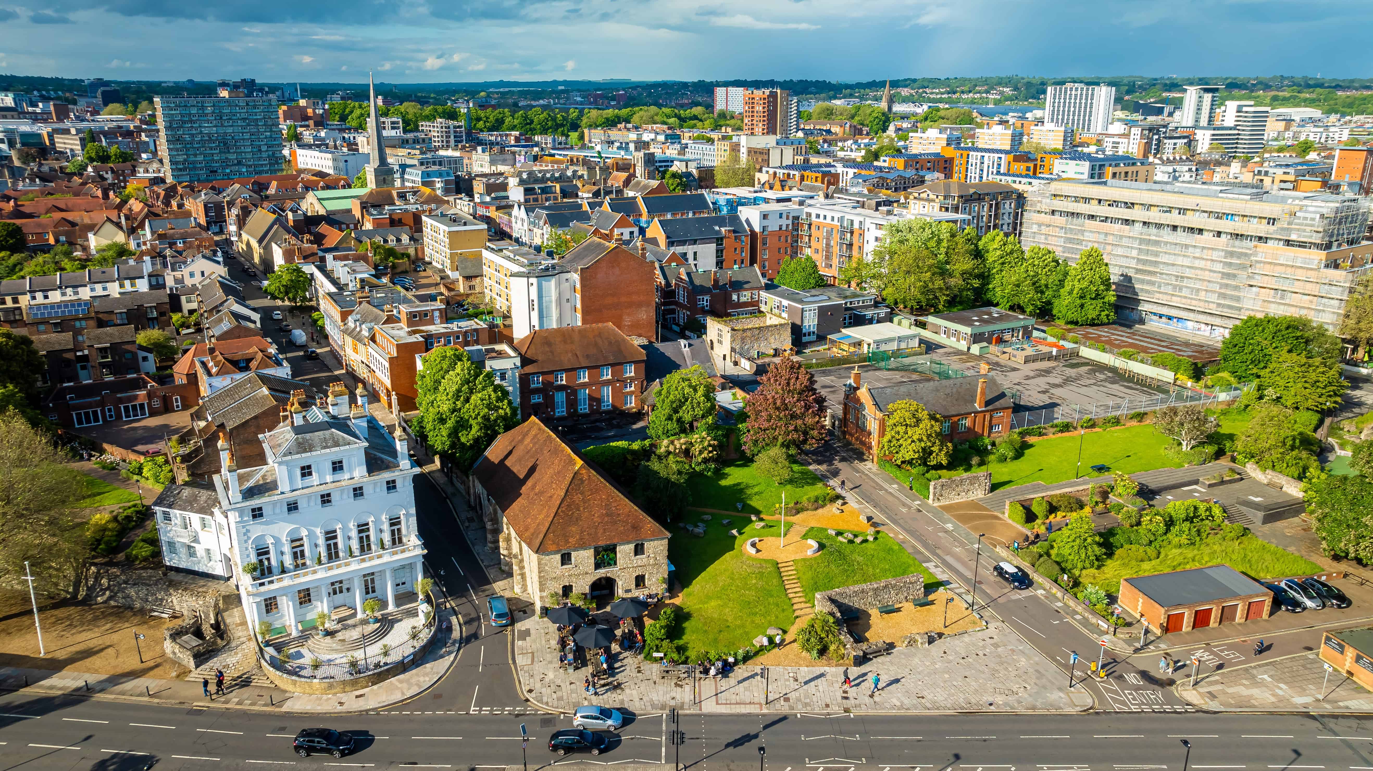 Aerial view of Winchester city in Hampshire with historic buildings and modern development, where Fusion Fibre Group delivers ultrafast full fibre broadband.
