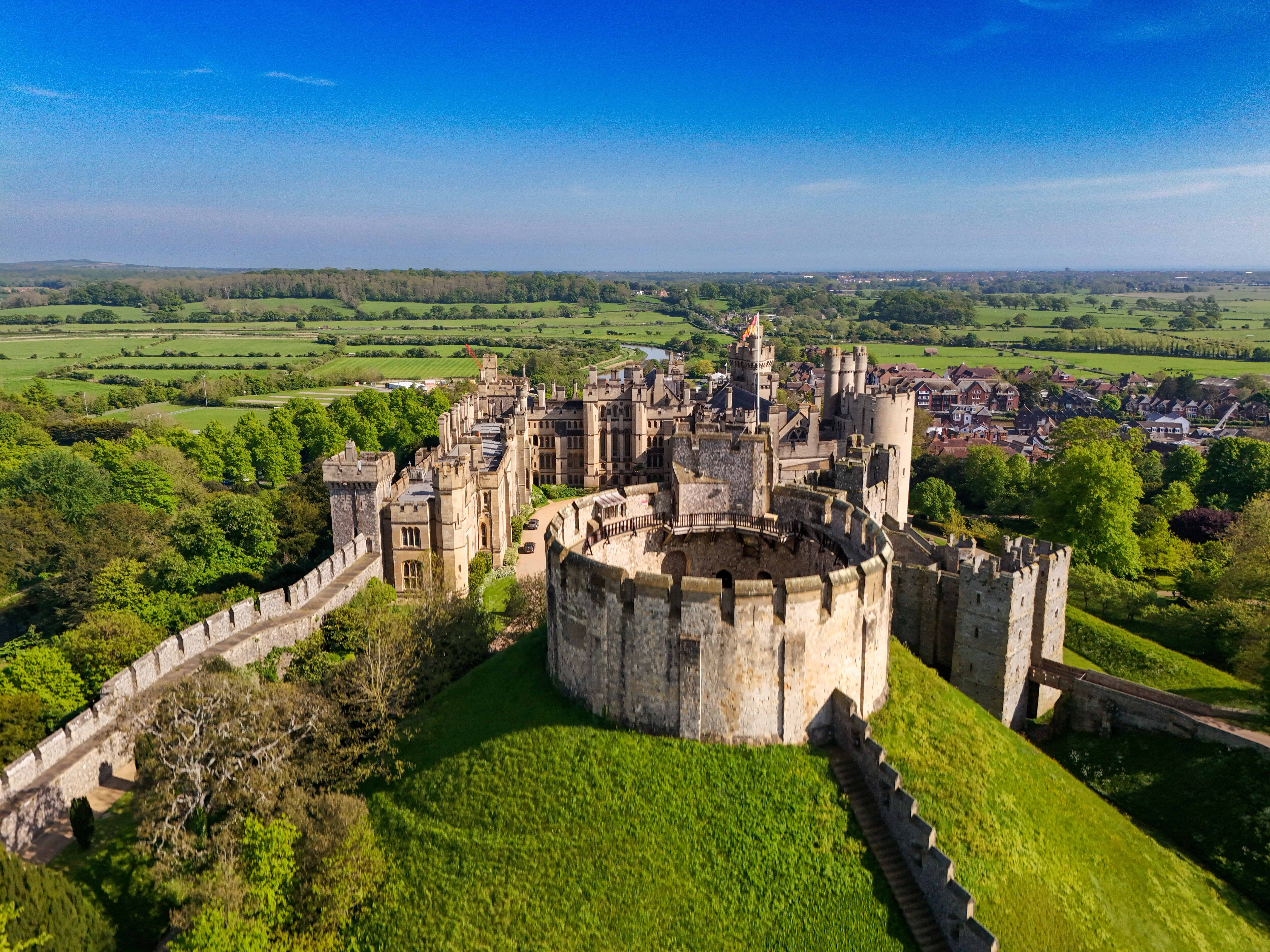 Aerial view of Arundel Castle in West Sussex surrounded by countryside, representing heritage alongside modern connectivity with Fusion Fibre Group’s full fibre broadband in West Sussex.